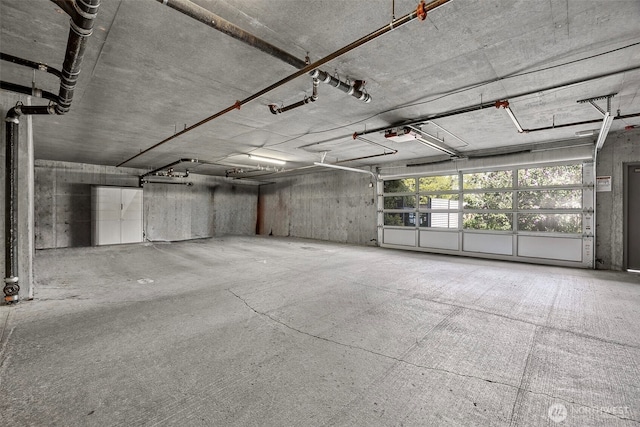 430 SW 156th St Unit 204, Burien, WA 98166 - parking deck with a garage door opener