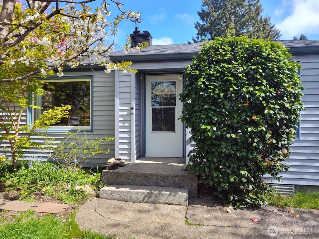 14818 5th Ave NE, Shoreline, WA 98155 - doorway to property featuring a chimney