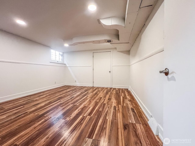 1915 Dexter Ave N, Seattle, WA 98109 - below grade area featuring wood finished floors, baseboards, and recessed lighting