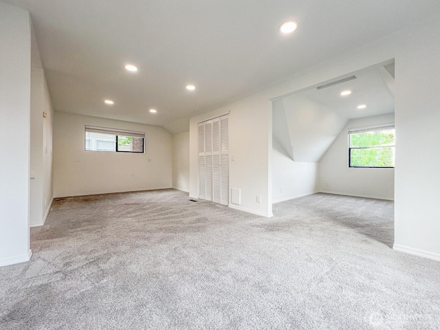 1915 Dexter Ave N, Seattle, WA 98109 - additional living space featuring carpet flooring, recessed lighting, baseboards, and lofted ceiling