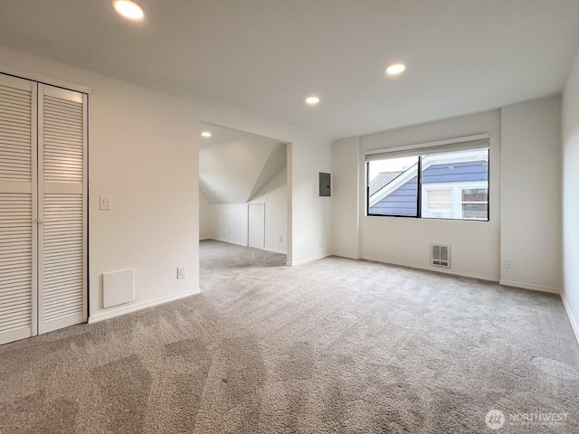 1915 Dexter Ave N, Seattle, WA 98109 - bonus room featuring carpet flooring, recessed lighting, baseboards, electric panel, and vaulted ceiling