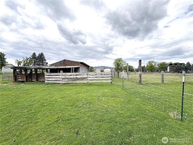 54 Jaquish Rd, Omak, WA 98841 - view of yard with an exterior structure, an outbuilding, and a rural view