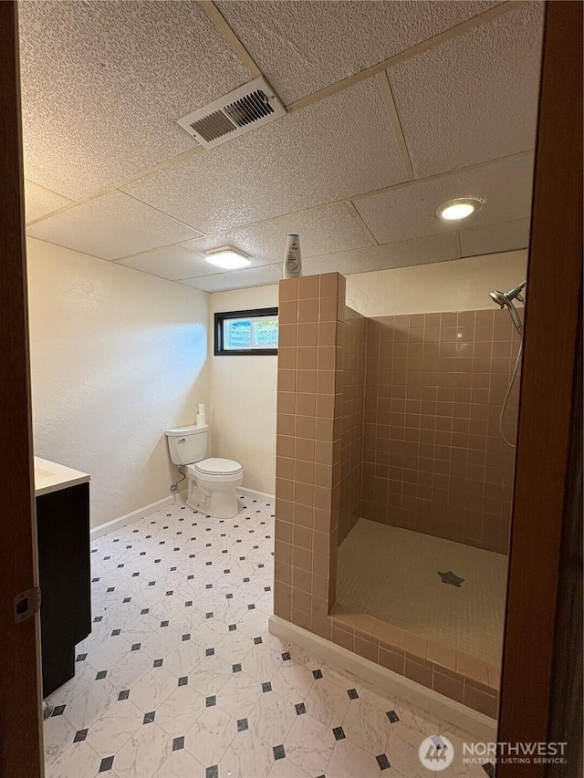 54 Jaquish Rd, Omak, WA 98841 - bathroom with toilet, a stall shower, baseboards, vanity, and tile patterned floors