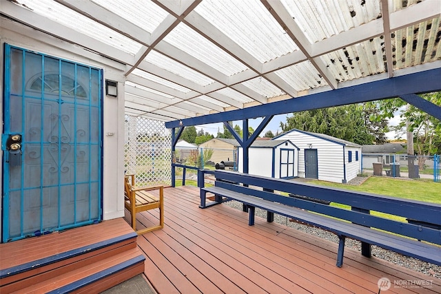 1811 S Sprague Ave, Tacoma, WA 98405 - wooden deck with a shed and an outbuilding