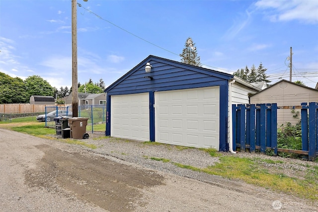 1811 S Sprague Ave, Tacoma, WA 98405 - detached garage featuring fence