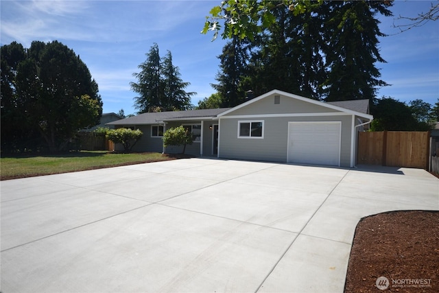 64 Queets St, Steilacoom, WA 98388 - ranch-style home featuring concrete driveway and an attached garage