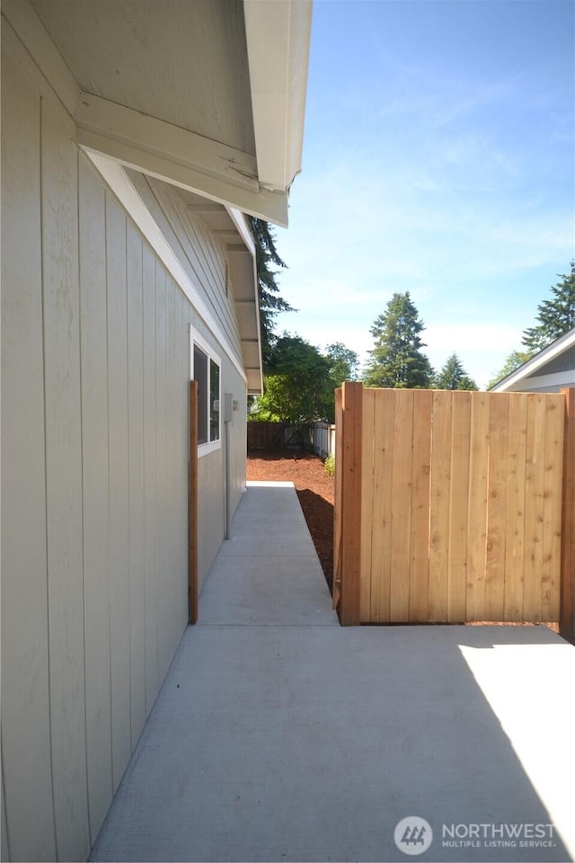 64 Queets St, Steilacoom, WA 98388 - view of side of property with a patio