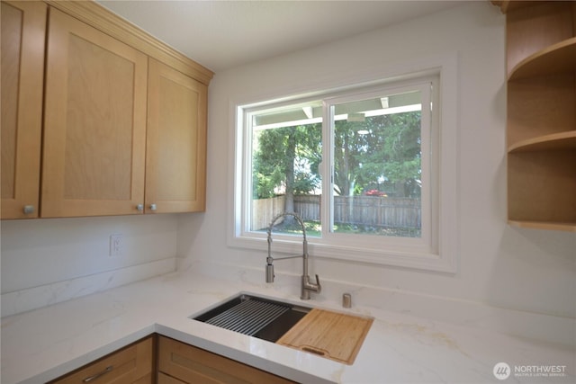 64 Queets St, Steilacoom, WA 98388 - kitchen with a sink, open shelves, and light brown cabinetry