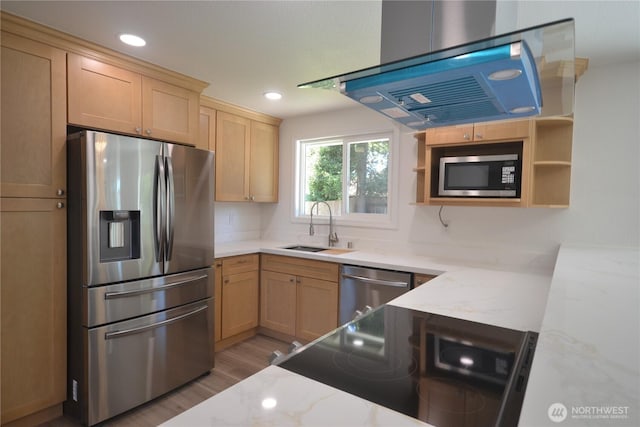 64 Queets St, Steilacoom, WA 98388 - kitchen with stainless steel appliances, a sink, light stone counters, light brown cabinets, and recessed lighting