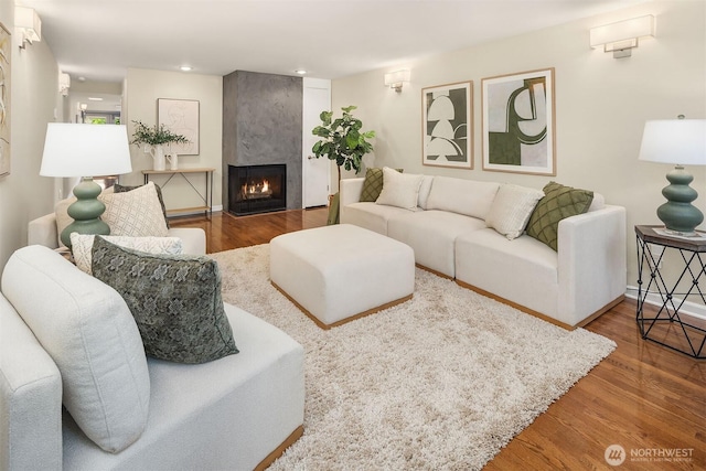 2345 42nd Ave E, Seattle, WA 98112 - living room featuring wood finished floors, a large fireplace, recessed lighting, and baseboards