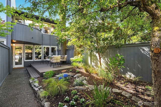 2345 42nd Ave E, Seattle, WA 98112 - fenced backyard featuring a deck