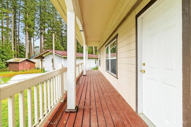 wooden terrace with covered porch