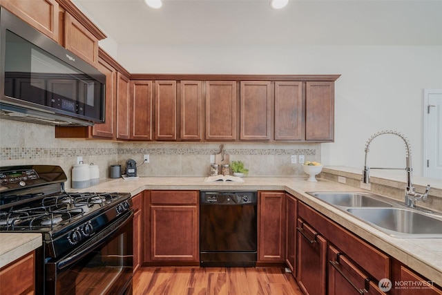 27815 NE 148th Ln, Duvall, WA 98019 - kitchen with black appliances, a sink, light countertops, backsplash, and recessed lighting