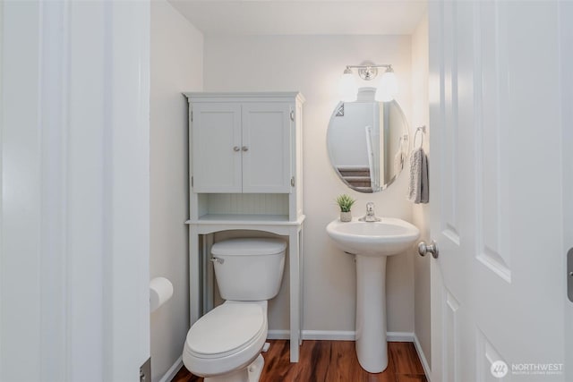 27815 NE 148th Ln, Duvall, WA 98019 - bathroom with toilet, wood finished floors, baseboards, and a sink