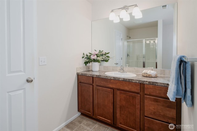 27815 NE 148th Ln, Duvall, WA 98019 - bathroom featuring a shower stall, vanity, and baseboards