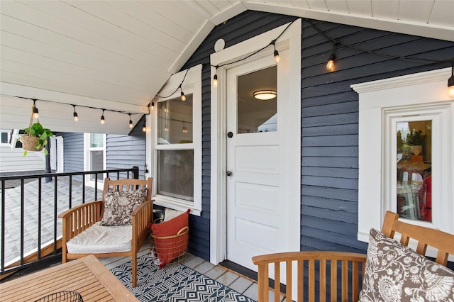 property entrance featuring covered porch