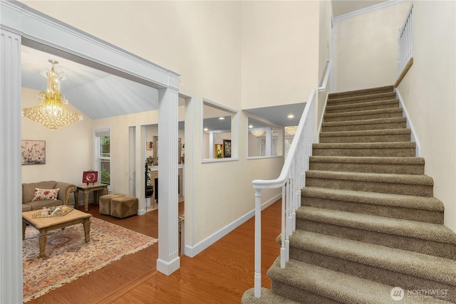 21842 NE 30th Pl, Sammamish, WA 98074 - stairs with wood finished floors and a chandelier