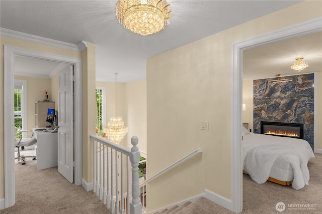 21842 NE 30th Pl, Sammamish, WA 98074 - hall featuring a chandelier, carpet, an upstairs landing, and ornamental molding