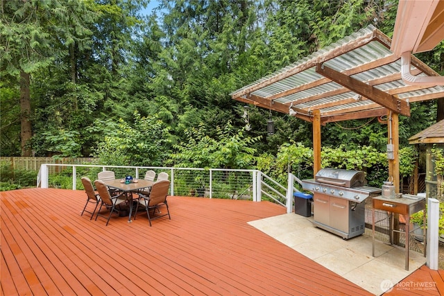 21842 NE 30th Pl, Sammamish, WA 98074 - wooden terrace featuring grilling area, a pergola, and outdoor dining area