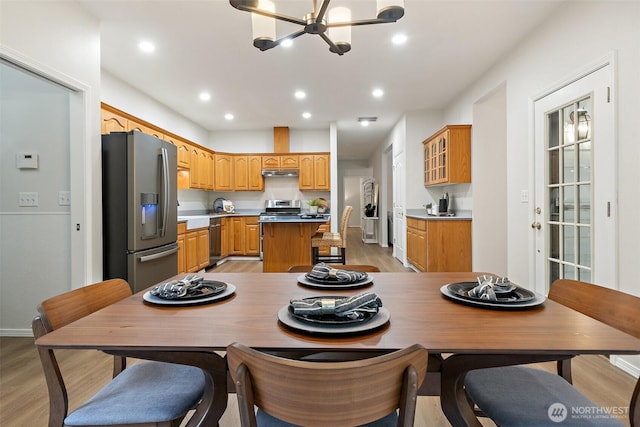 13212 Wicks End Ln SW, Port Orchard, WA 98367 - dining area with a chandelier, light wood-type flooring, baseboards, and recessed lighting
