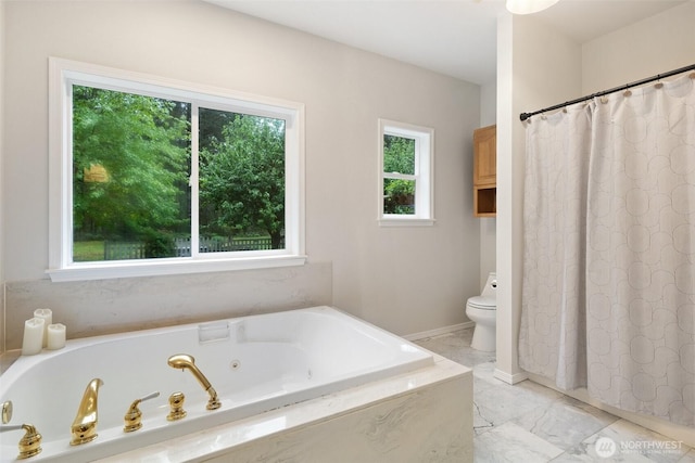 13212 Wicks End Ln SW, Port Orchard, WA 98367 - bathroom featuring marble look tile flooring, toilet, a whirlpool tub, and curtained shower