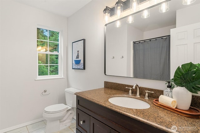 13212 Wicks End Ln SW, Port Orchard, WA 98367 - bathroom with toilet, tile patterned floors, vanity, baseboards, and a shower with shower curtain
