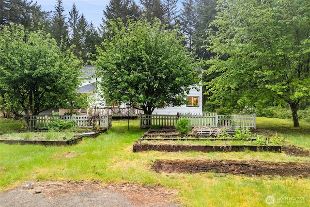 13212 Wicks End Ln SW, Port Orchard, WA 98367 - view of yard with a vegetable garden and fence