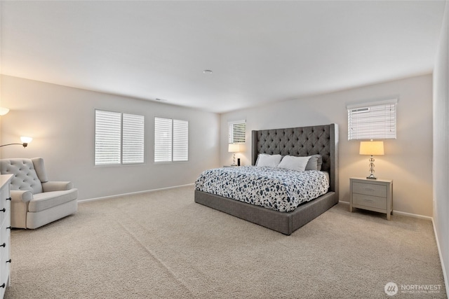 carpeted bedroom with baseboards