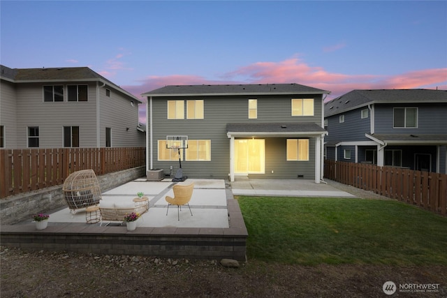 rear view of house featuring a patio