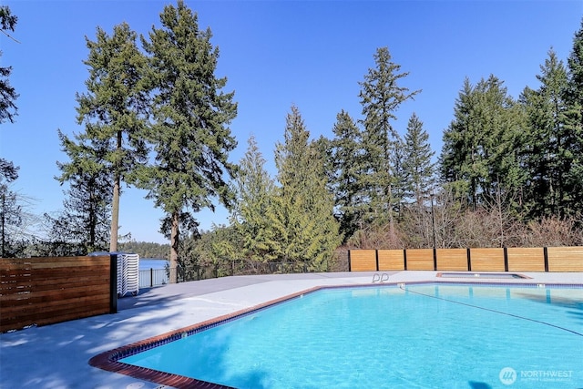 22717 Briarwood Ct SE, Yelm, WA 98597 - view of swimming pool with fence and a patio