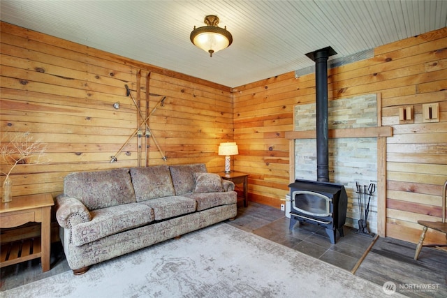 531 3rd St, Ronald, WA 98940 - living room featuring a wood stove and wooden walls