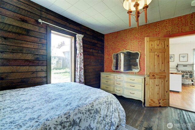 531 3rd St, Ronald, WA 98940 - bedroom featuring wallpapered walls and dark wood-type flooring