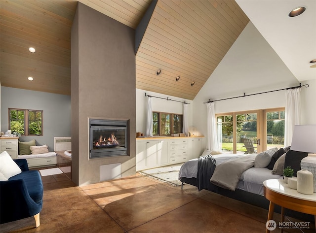 30404 44th Ave NW, Stanwood, WA 98292 - bedroom featuring high vaulted ceiling, a multi sided fireplace, multiple windows, recessed lighting, and concrete floors