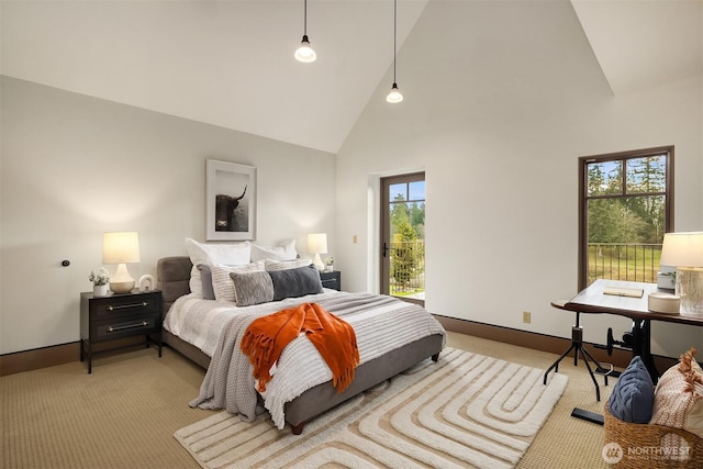 30404 44th Ave NW, Stanwood, WA 98292 - bedroom featuring high vaulted ceiling, light colored carpet, access to exterior, and baseboards