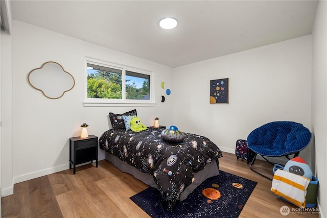 21326 5th Ave S, Des Moines, WA 98198 - bedroom with wood finished floors and baseboards
