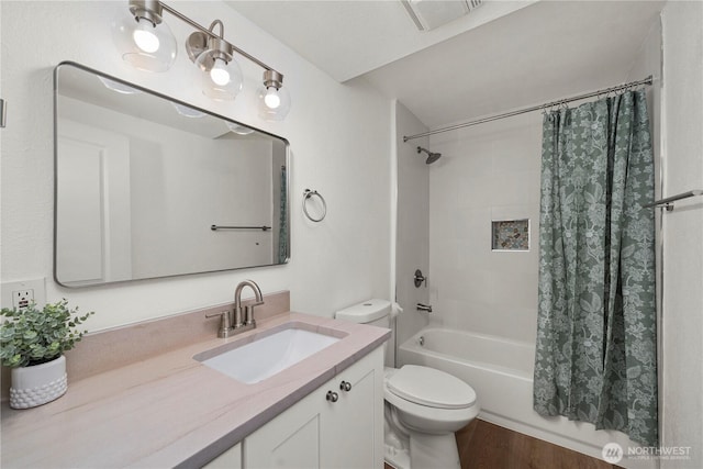 21326 5th Ave S, Des Moines, WA 98198 - bathroom featuring toilet, shower / bathtub combination with curtain, vanity, and wood finished floors