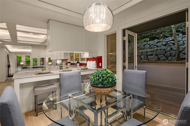 8902 N Mercer Way, Mercer Island, WA 98040 - dining area featuring light wood finished floors and ornamental molding