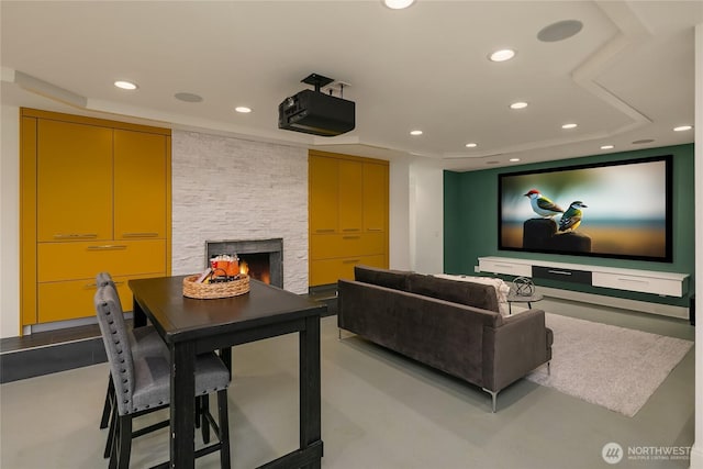 8902 N Mercer Way, Mercer Island, WA 98040 - home theater with a stone fireplace, recessed lighting, and a tray ceiling