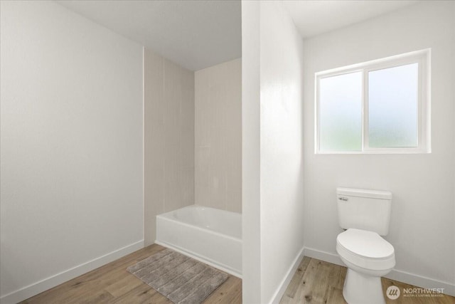 1405 33rd St, Seaview, WA 98644 - full bath featuring wood finished floors, toilet, and baseboards