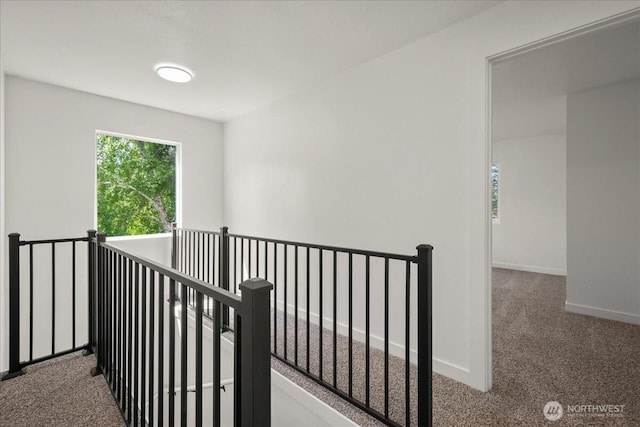 1405 33rd St, Seaview, WA 98644 - corridor with carpet flooring, an upstairs landing, and baseboards