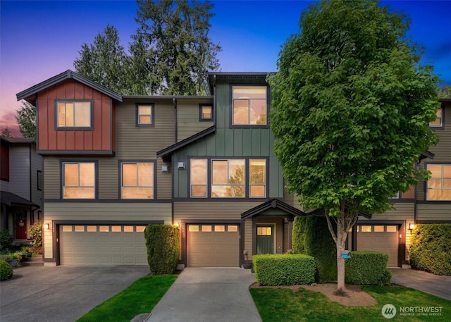 16404 1st Dr SE, Bothell, WA 98012 - view of front facade featuring board and batten siding, a garage, and concrete driveway