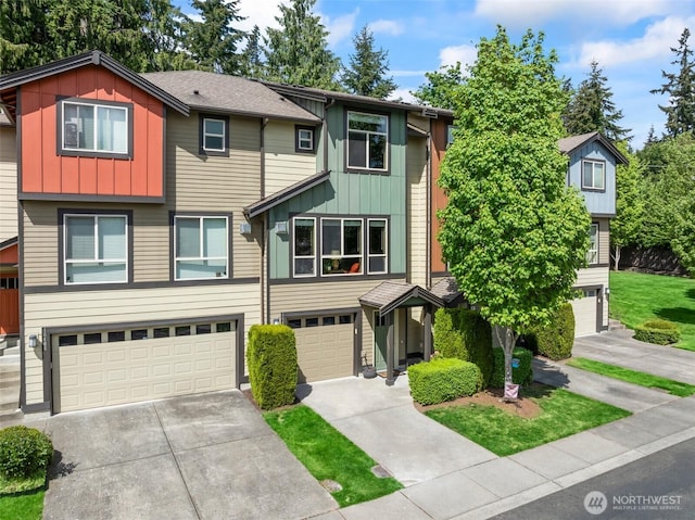16404 1st Dr SE, Bothell, WA 98012 - view of front of house featuring a garage, board and batten siding, and driveway