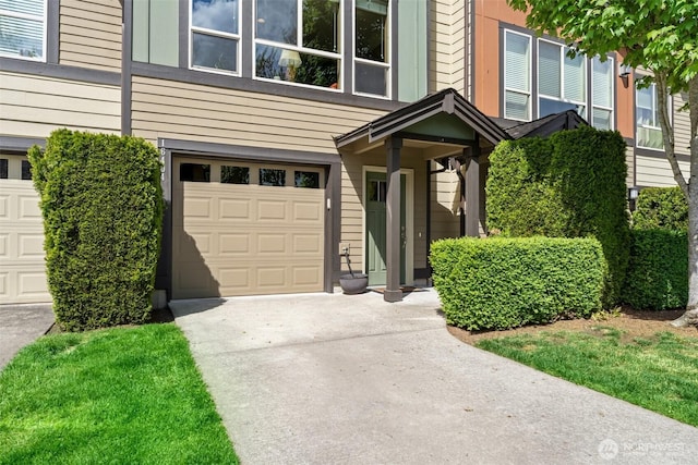 16404 1st Dr SE, Bothell, WA 98012 - view of exterior entry featuring driveway and a garage