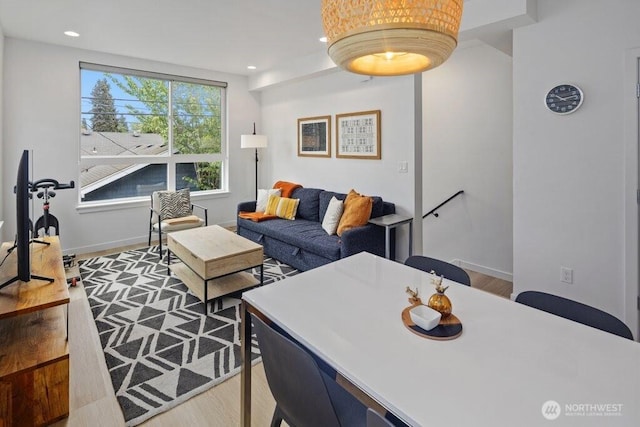 5710 Roosevelt Way NE Unit B, Seattle, WA 98105 - living room featuring wood finished floors, baseboards, and recessed lighting