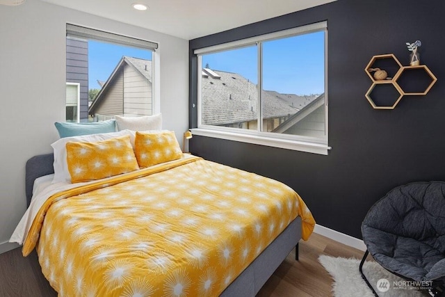 5710 Roosevelt Way NE Unit B, Seattle, WA 98105 - bedroom with wood finished floors, baseboards, and recessed lighting