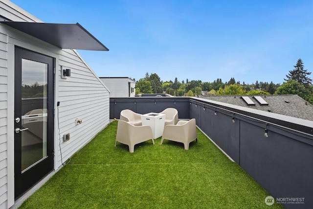 5710 Roosevelt Way NE Unit B, Seattle, WA 98105 - view of grassy yard with a balcony