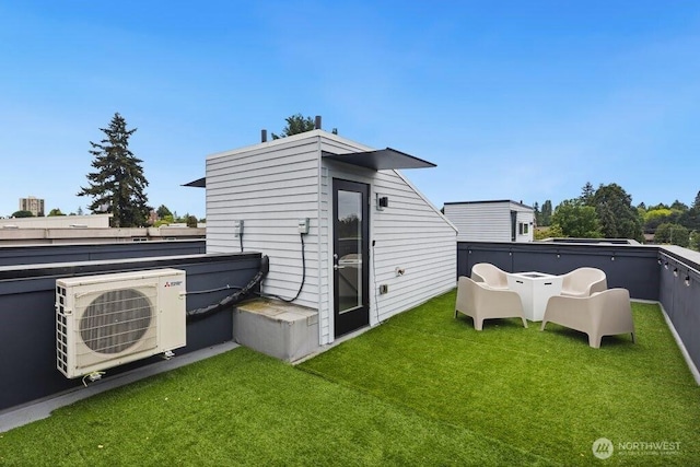 5710 Roosevelt Way NE Unit B, Seattle, WA 98105 - rear view of house featuring a cooling unit, a lawn, and an outdoor structure