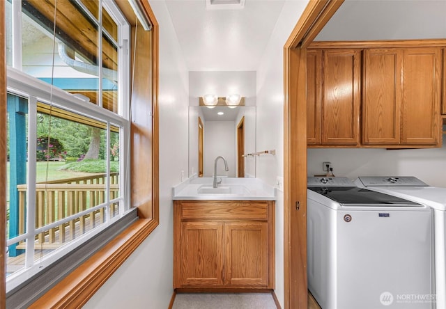 8368 Birdsview Meadows Ln, Concrete, WA 98237 - washroom featuring cabinet space, washer and dryer, and plenty of natural light