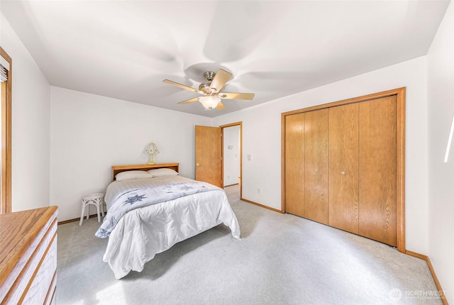 8368 Birdsview Meadows Ln, Concrete, WA 98237 - bedroom with baseboards, light carpet, ceiling fan, and a closet
