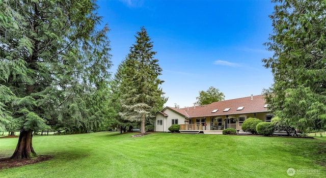 8368 Birdsview Meadows Ln, Concrete, WA 98237 - view of grassy yard with a wooden deck